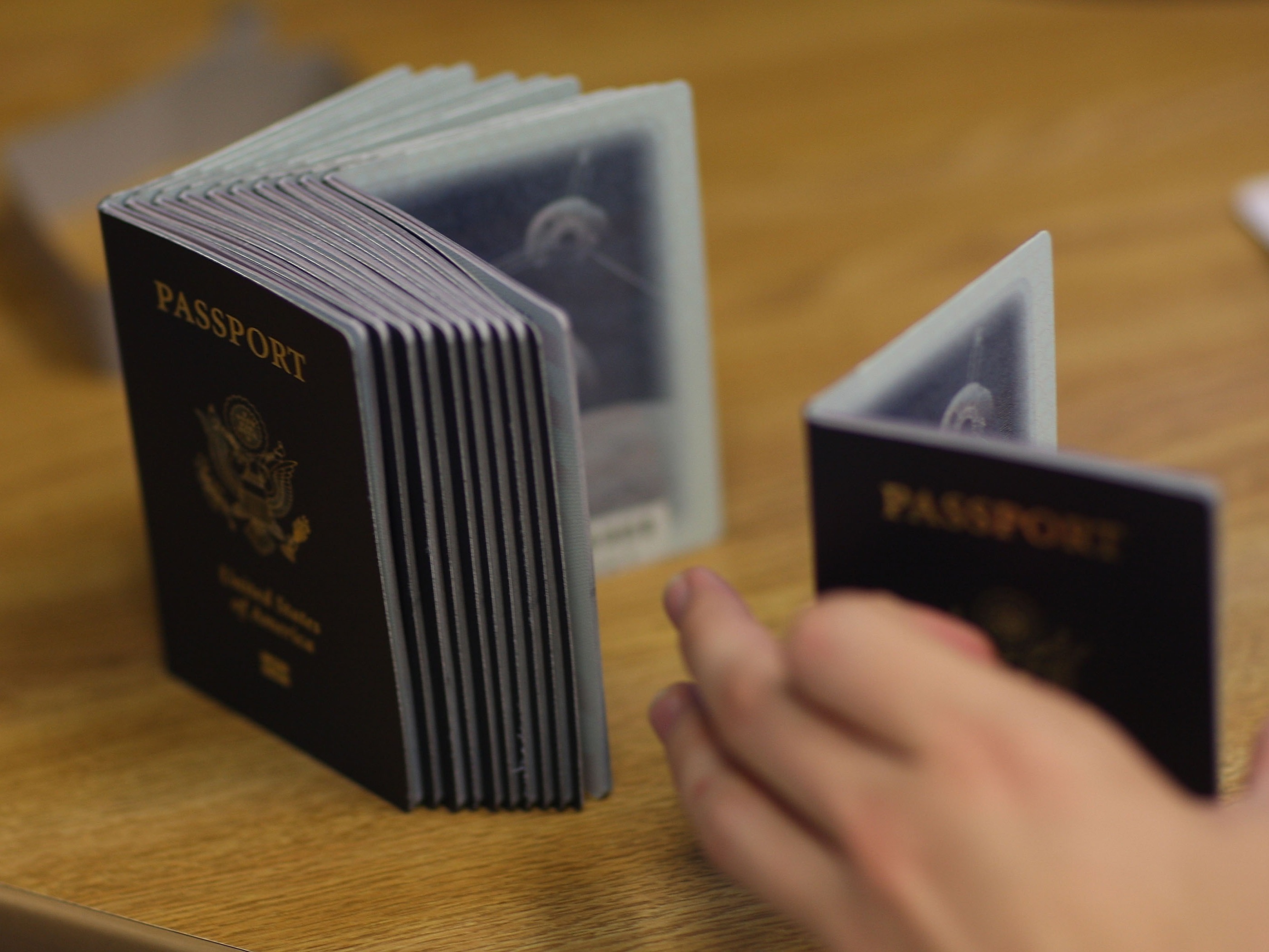 caption: The U.S. is on track to surpass the record-setting 22 million passports issued last year.