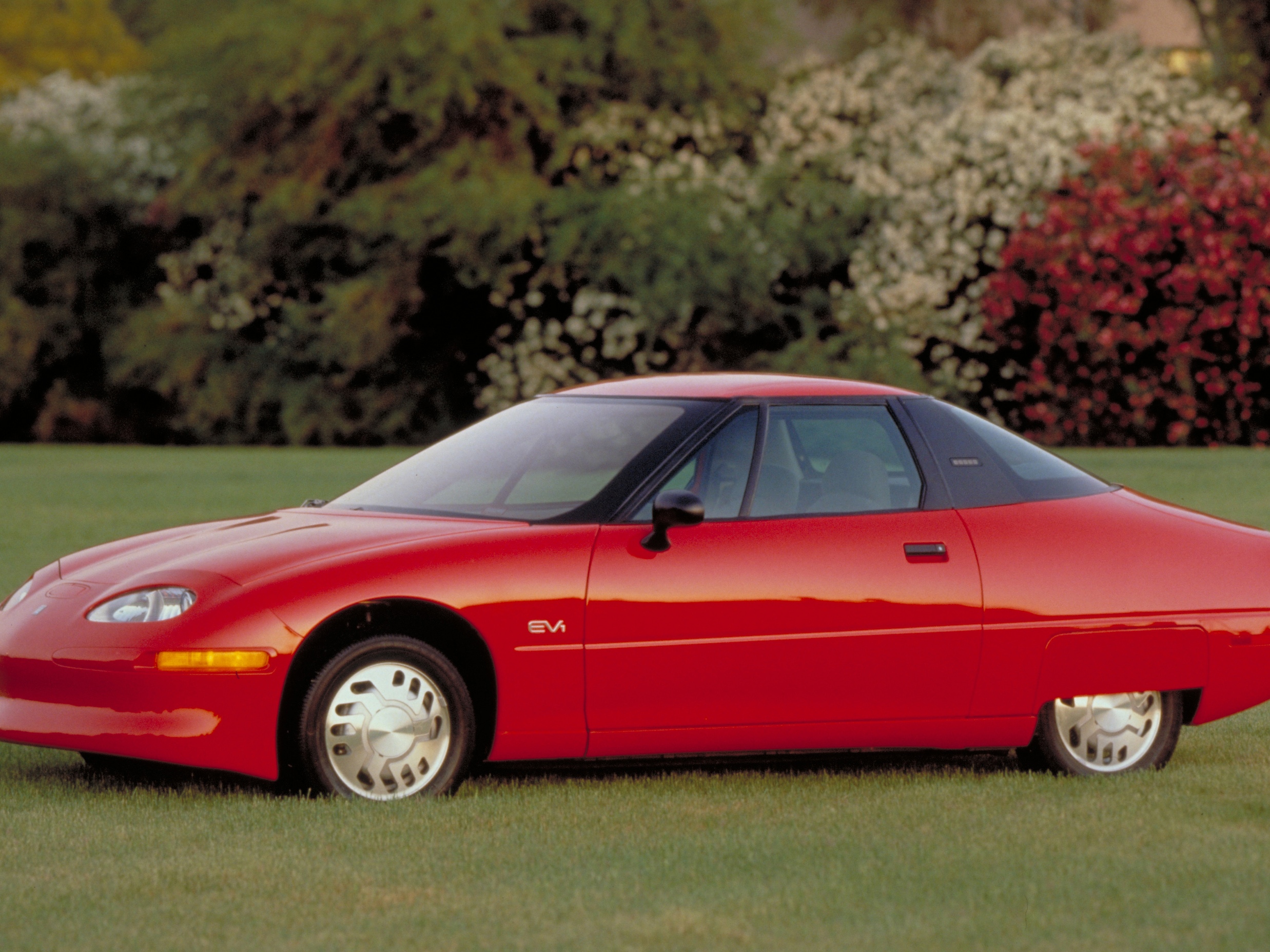 caption: The General Motors EV1 pioneered technology you can still find in electric vehicles today. Just over 1,000 were built, and the cars were only available for lease in a few states.