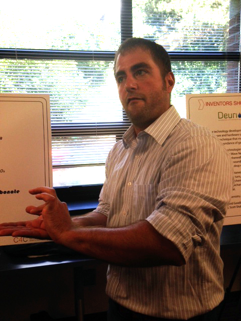 caption: Tim Dardis explains the idea behind Project Canton's injury reducing football helmet.