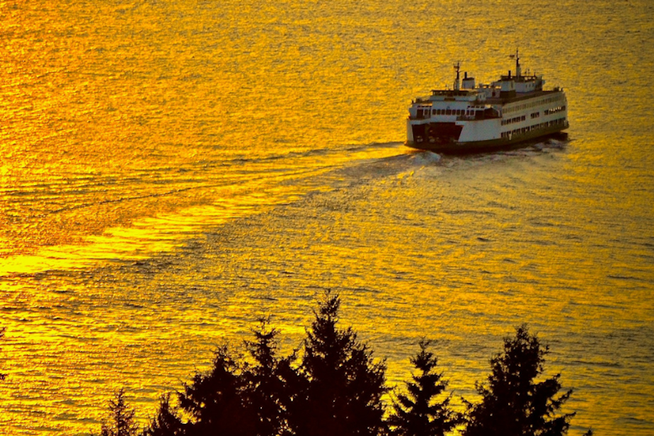 caption: A Washington State Ferry crossing Puget Sound, seen from West Seattle. 