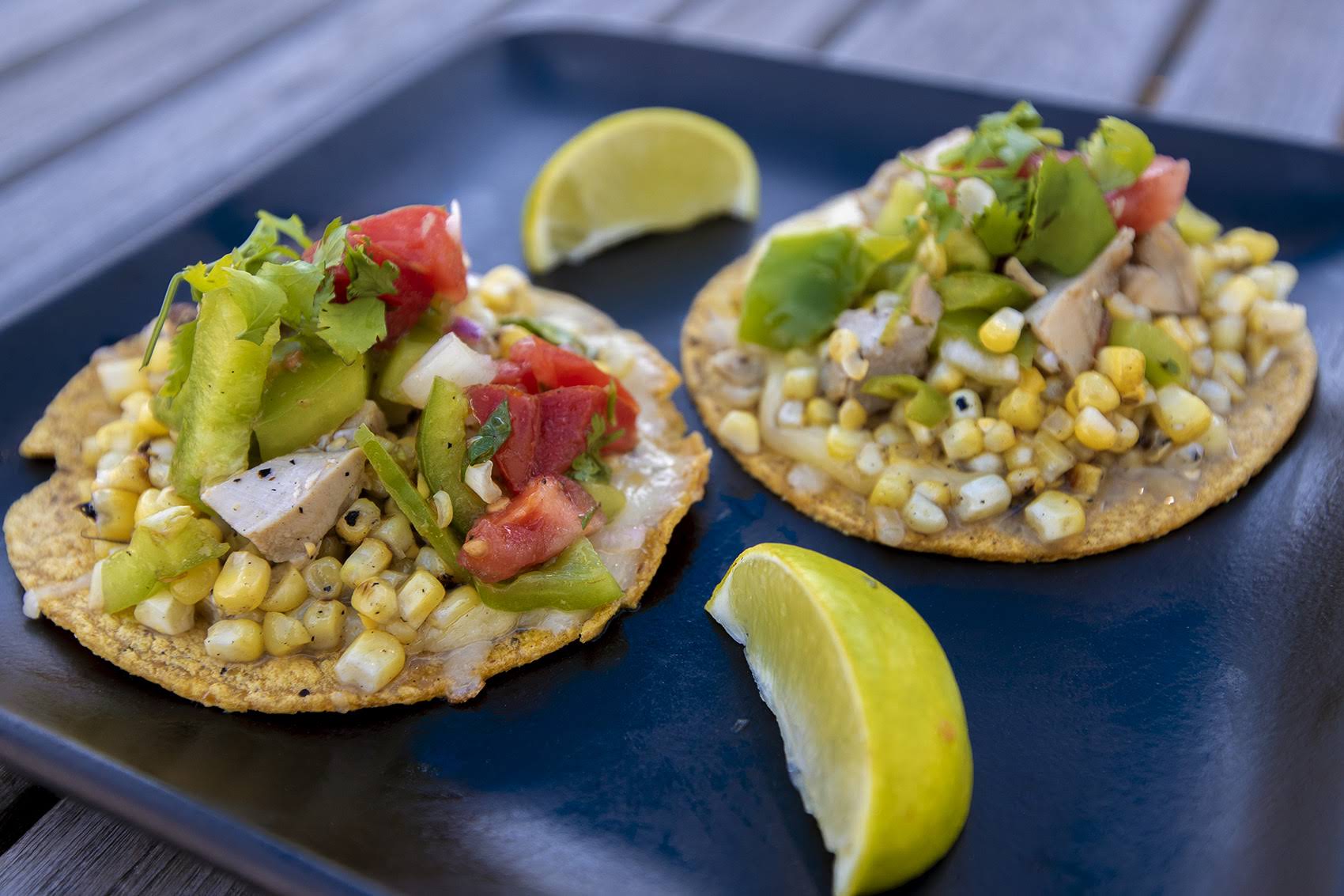 caption: Grilled corn and chicken tacos on corn tortillas (Jesse Costa/WBUR)