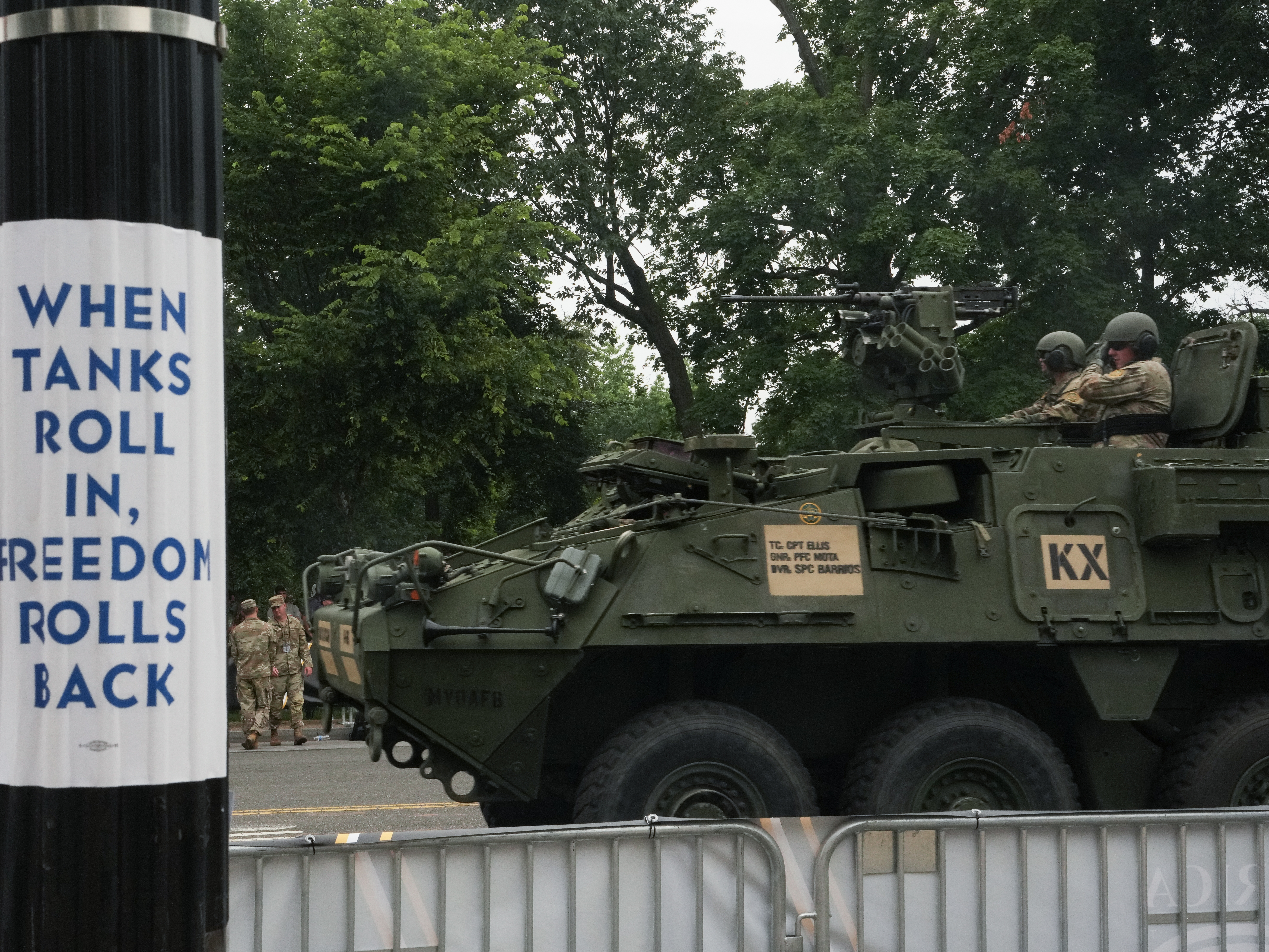 caption: Members of the U.S. Army drive a Stryker infantry carrier vehicle during Saturday's 250th anniversary parade in Washington, D.C.