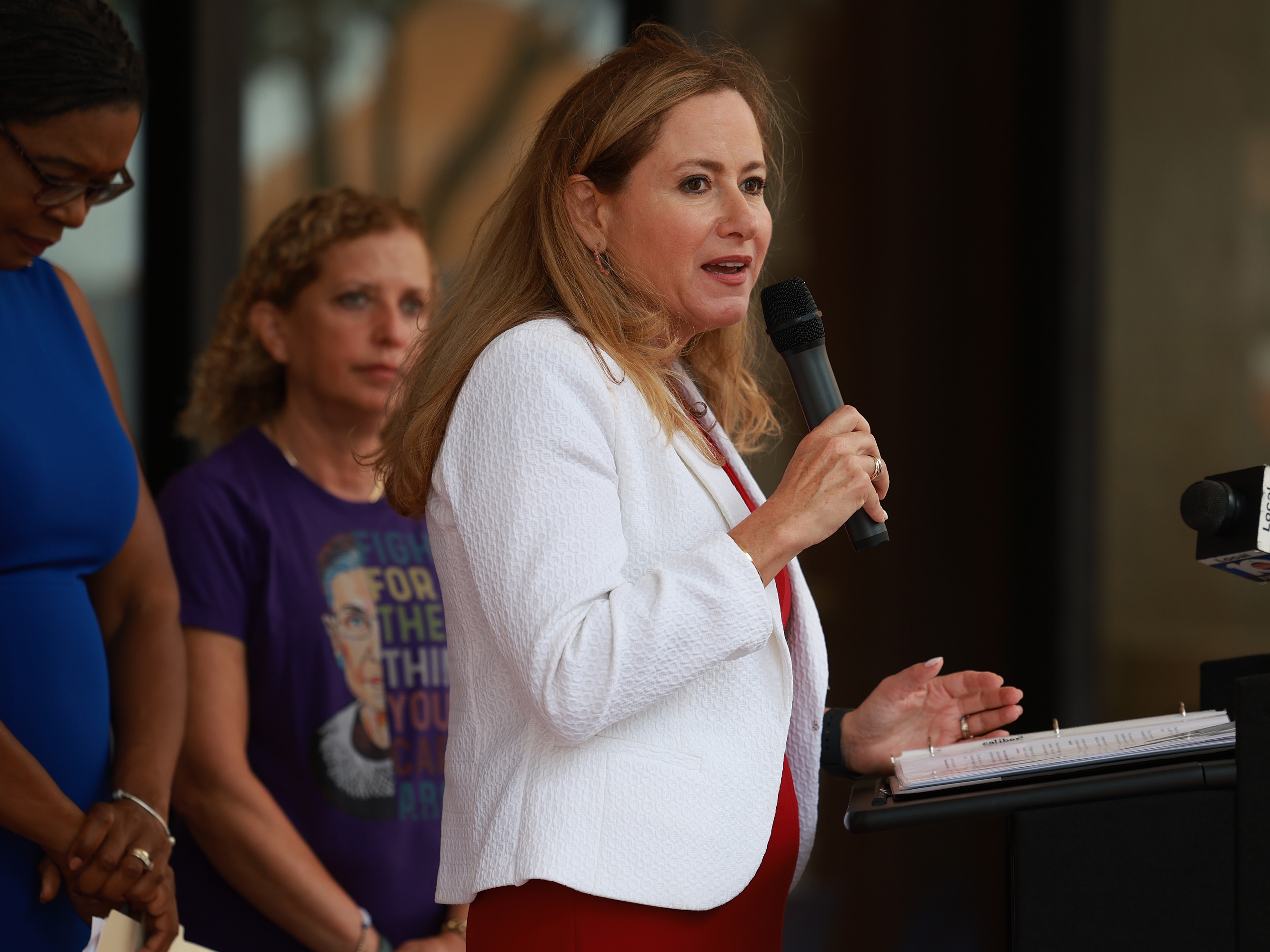 caption: Democrat Debbie Mucarsel-Powell is launching a text campaign on the messaging app WhatsApp to directly reach voters.