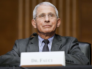 caption: Dr. Anthony Fauci, director of the National Institute of Allergy and Infectious Diseases, testifies this month during a Senate hearing at the U.S. Capitol.