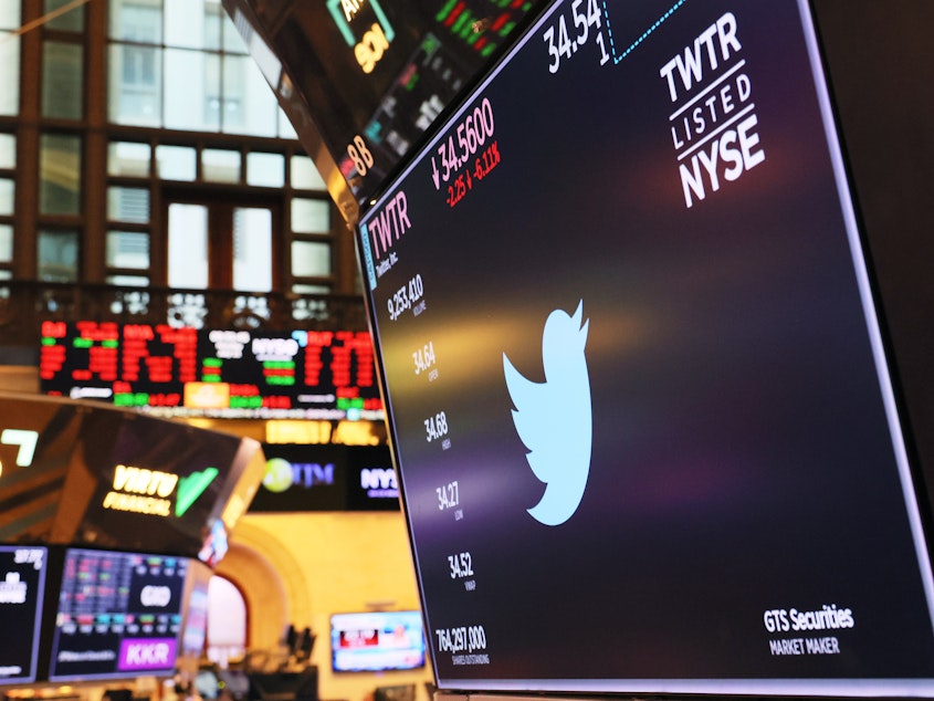 caption: A Twitter logo is displayed on a screen at the New York Stock Exchange in early July.