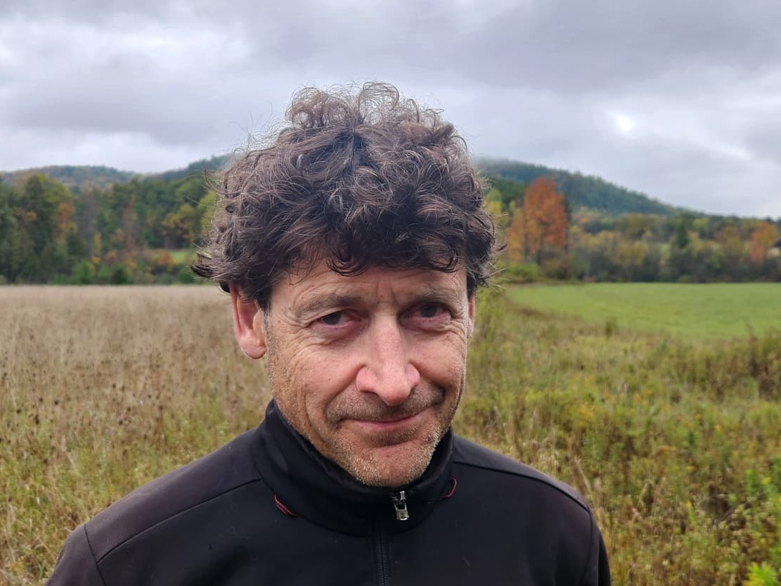 caption: John Davis, 62, says he decided not to have children. He's part of an environmental group called the Rewilding Institute that supports returning land to natural habitat. "We need to encourage a small family ethic, especially among affluent people," he told NPR.