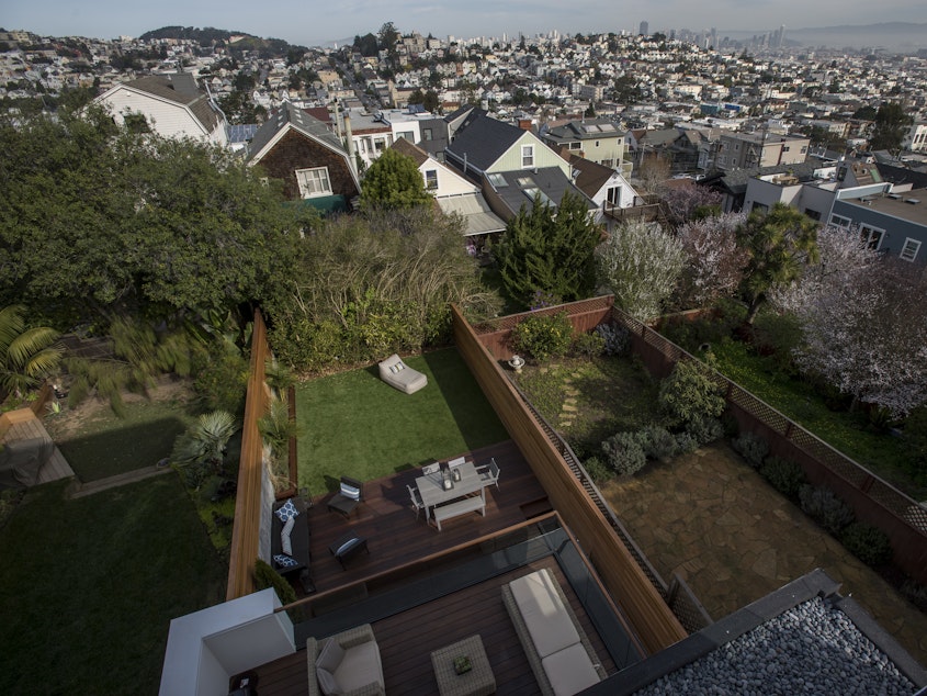 caption: Income inequality in the U.S. grew worse in California and eight other states in 2018, the U.S. Census Bureau says. Here, a file photo shows the view from the balcony of a house listed at $5.5 million in San Francisco.