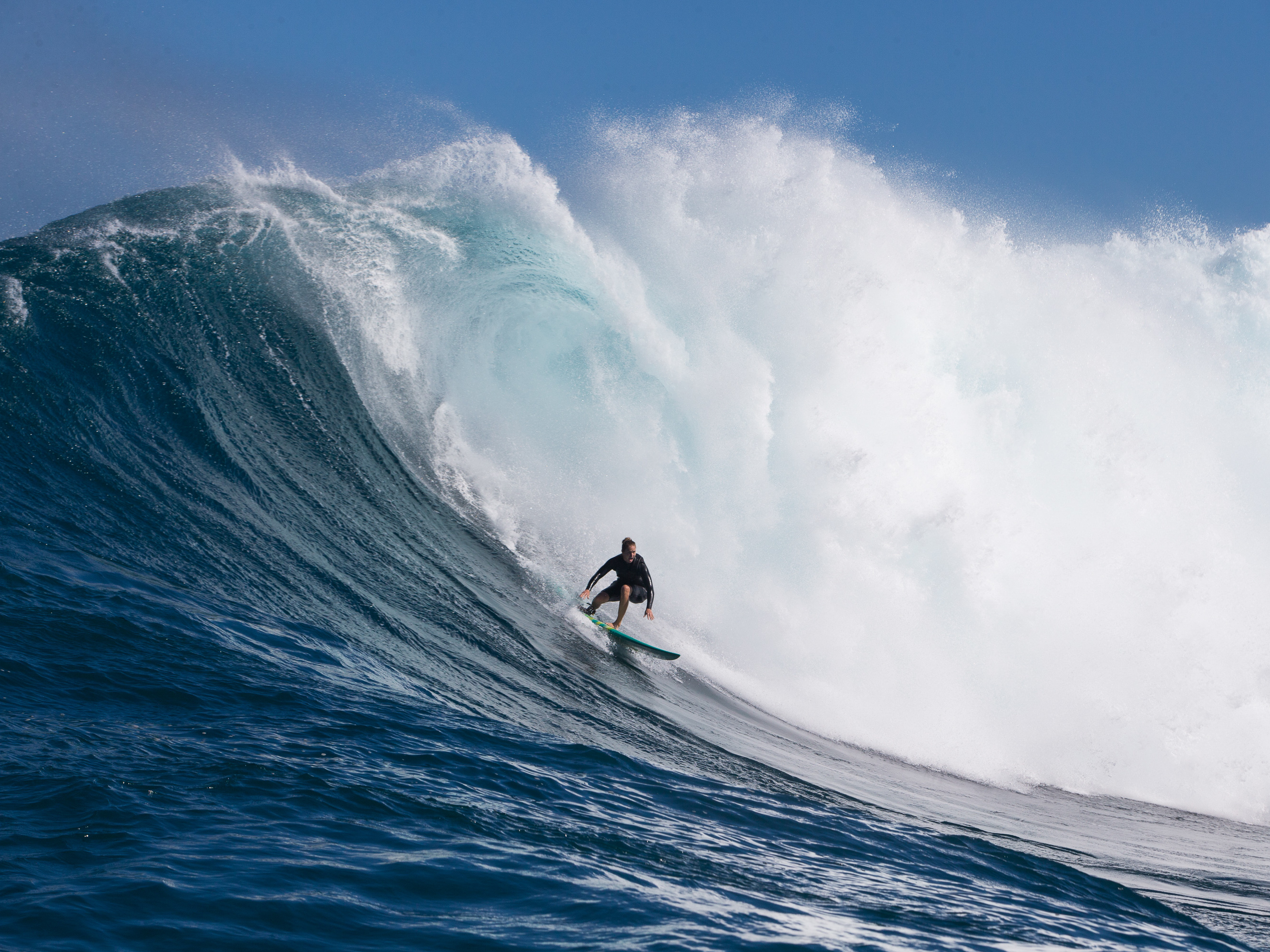 caption: Cunningham shot this image of Paige Alms during a free surf in Maui on Jan. 12, 2018