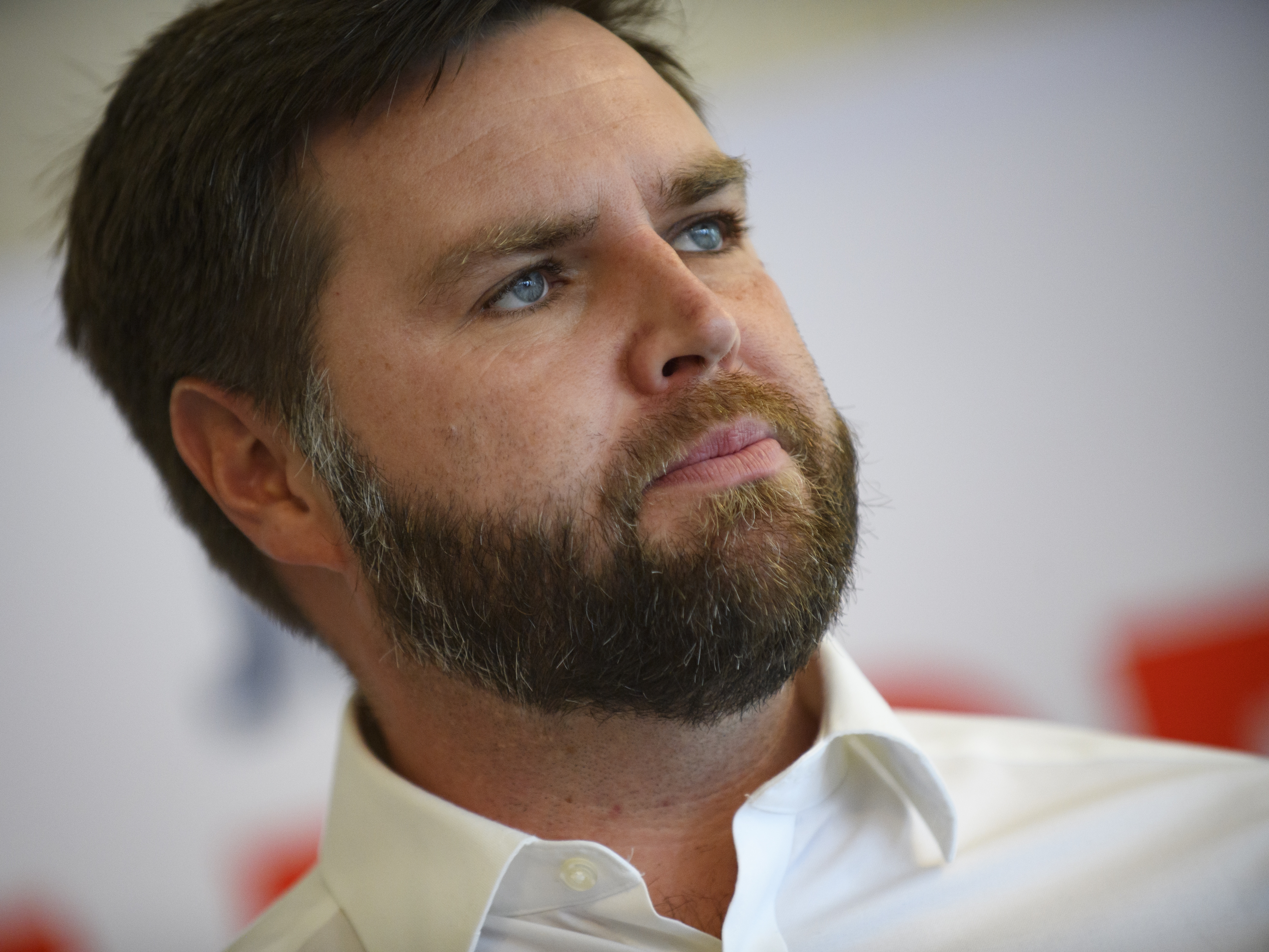 caption: Then-candidate JD Vance speaks to supporters at the Aurora Inn Event Center on October 13, 2022 in Aurora, Ohio.