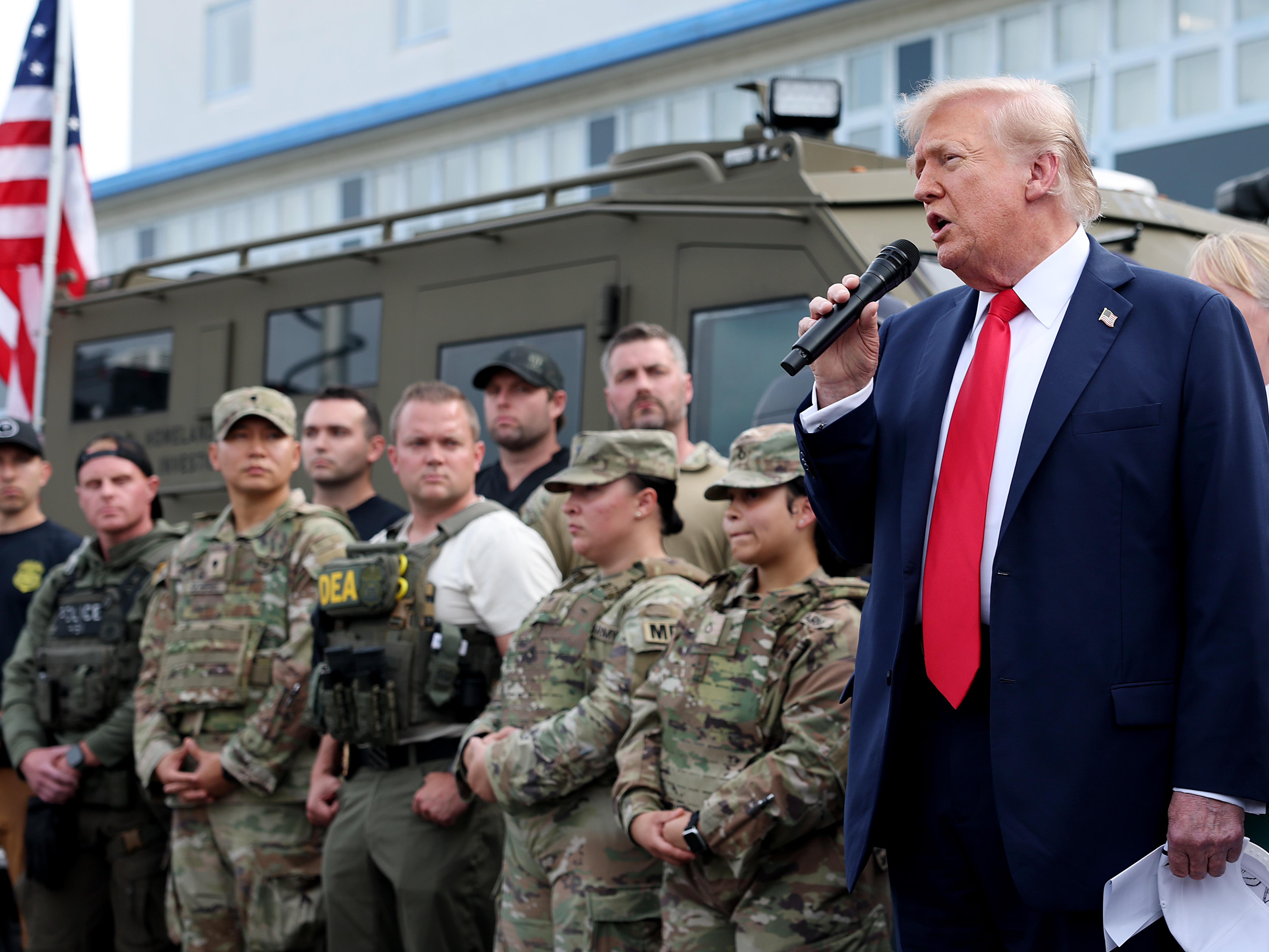 caption: President Trump visits the U.S. Park Police Anacostia Operations Facility on August 21 in Washington, D.C. The Trump administration has deployed federal officers and the National Guard to the district to place the D.C. Metropolitan Police Department under federal control and assist in crime prevention in the nation's capital.