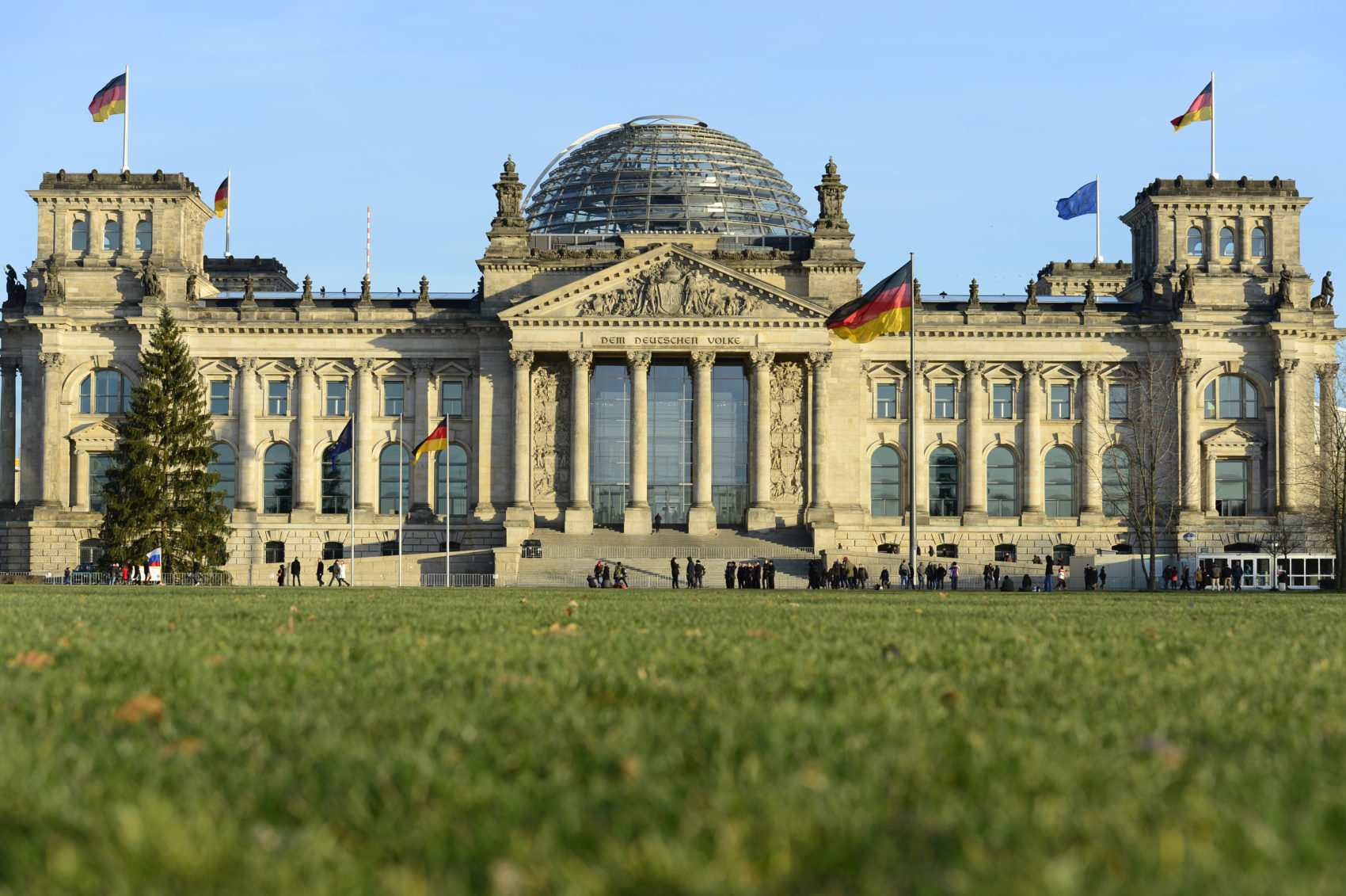 caption: The Reichstag building in Berlin houses the German parliament Bundestag. (John MacDougall/AFP via Getty Images)