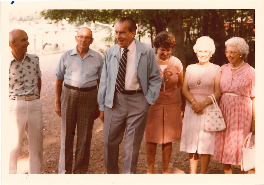 caption: One of the summer picnics. “We started out with just the agents, then it was the agents and some of their friends, and then some of the friends brought other people,” Endicott said. “We allowed this because (Nixon) enjoyed it. Endicott didn’t know any of the people captured in the photo by name, just that they were guests at the picnic.
