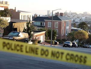 caption: Police tape is seen in front of the home of House Speaker Nancy Pelosi and her husband, Paul Pelosi, on Friday in San Francisco. Paul Pelosi was violently attacked in their home by an intruder.
