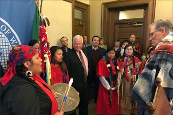 caption: After a 2018 bill signing ceremony in Olympia, women from several local tribes performed a song in honor of the missing and murdered Indigenous women in the U.S. and Canada.