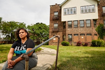 caption: Angela Lang, executive director of BLOC, Black Leaders Organizing for Communities sits for a portrait in front of her childhood home Aug. 7, 2018 Milwaukee. BLOC, a community based group works in Milwaukee neighborhoods with a purpose of uniting and informing its citizens of current issues along with political insight to better their community.
