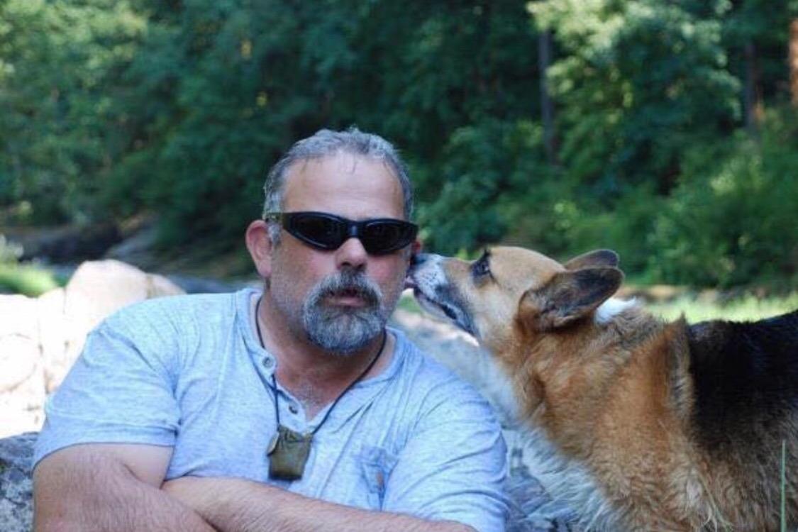 caption: Christian Johnson, 55, suffered burns over 60 percent of his body. The veteran firefighter was helping fight a small brush Sept. 1 fire near Okanogan. He died Wednesday, Oct. 3.
