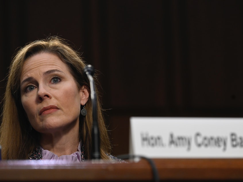 caption: Supreme Court nominee Amy Coney Barrett testifies before the Senate Judiciary Committee on Oct. 14, 2020. On Thursday, the committee voted to advance her nomination to the full Senate for a confirmation vote.