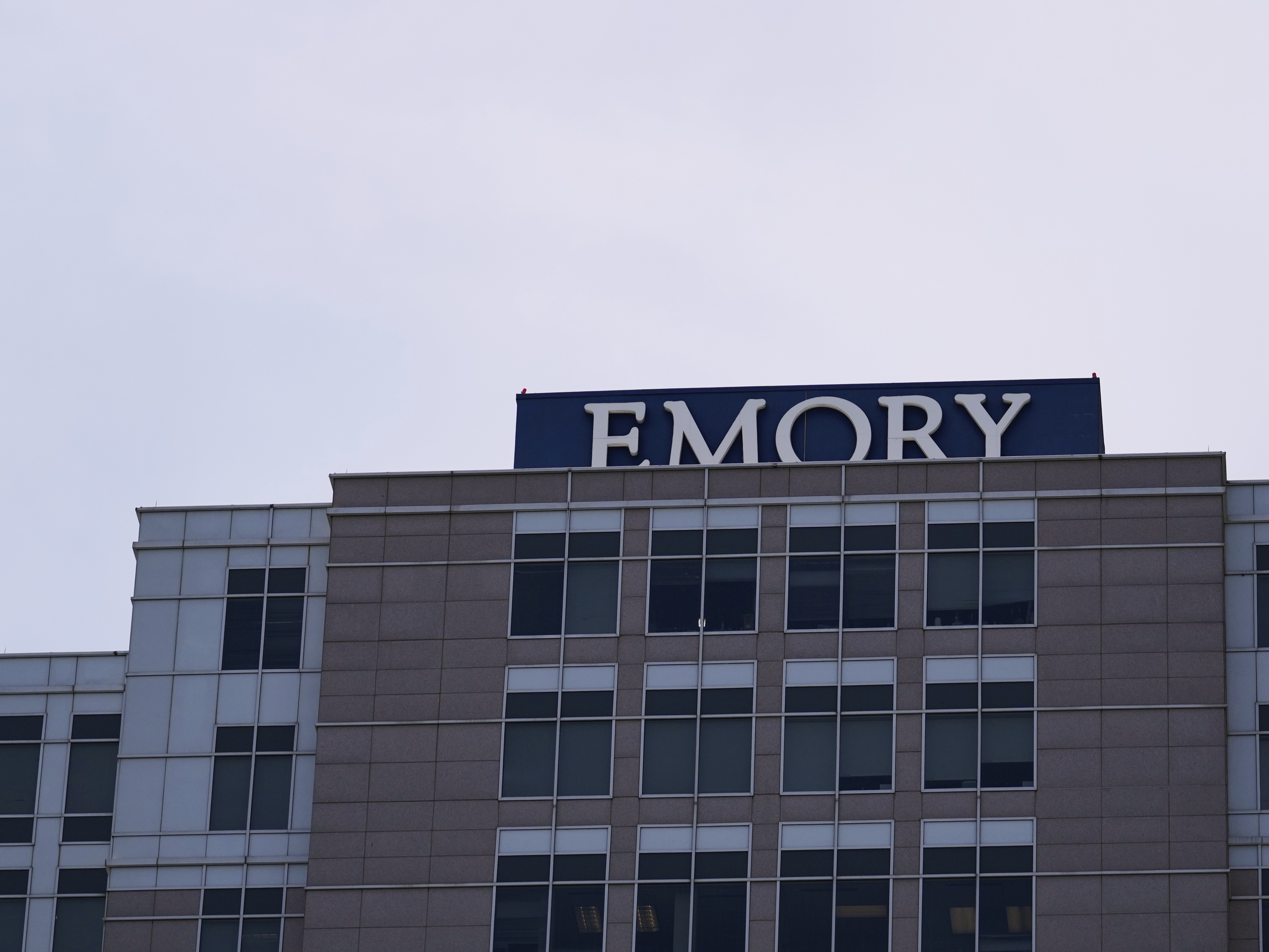 caption: Emory University Hospital Midtown is seen on Thursday in Atlanta.