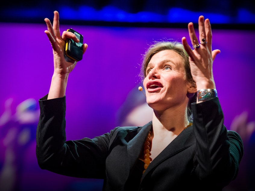 caption: Mariana Mazzucato on the TED stage.
