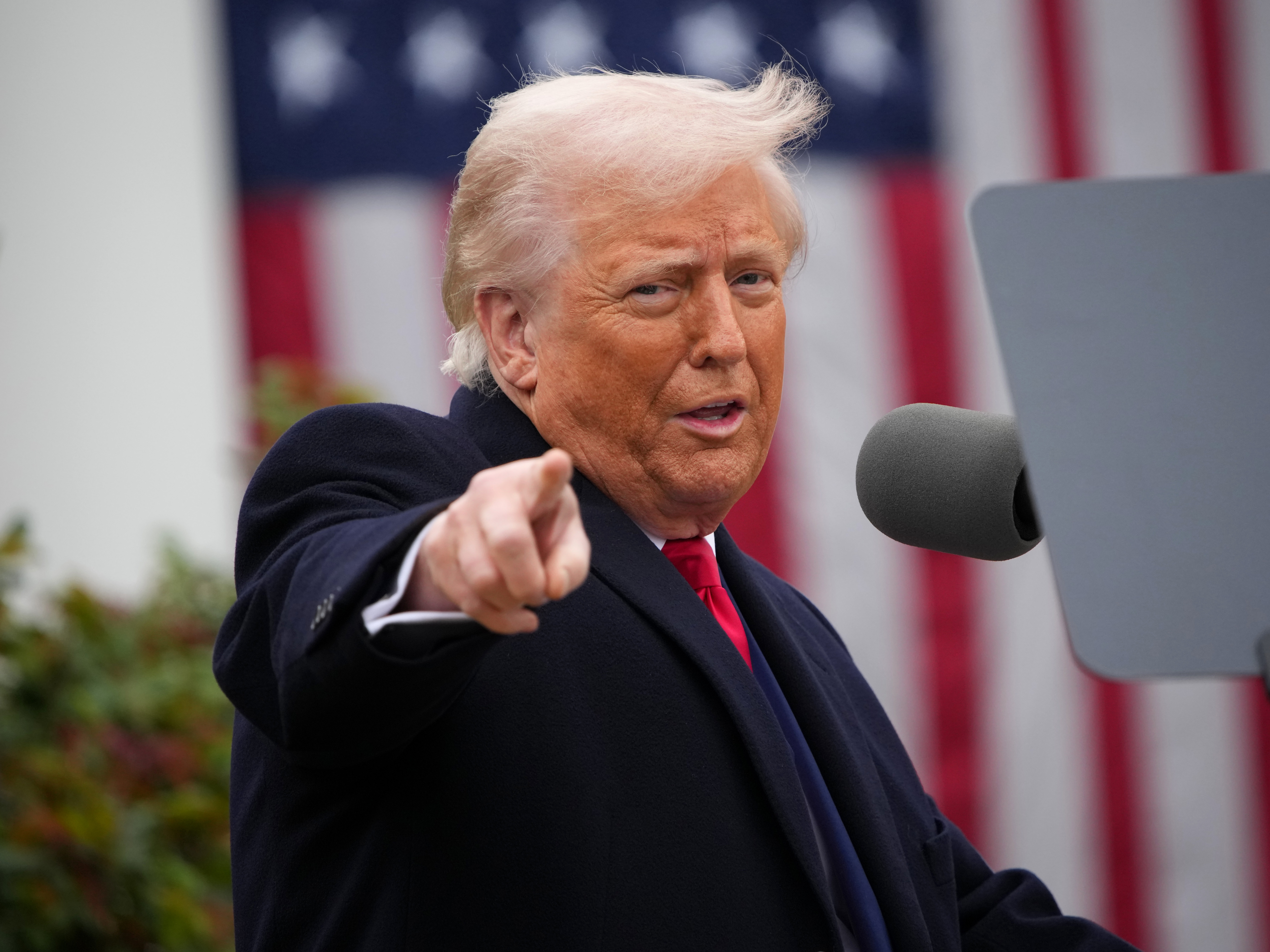 caption: President Trump announces an initial sweeping round of tariffs in the Rose Garden of the White House in Washington, D.C., on April 2.
