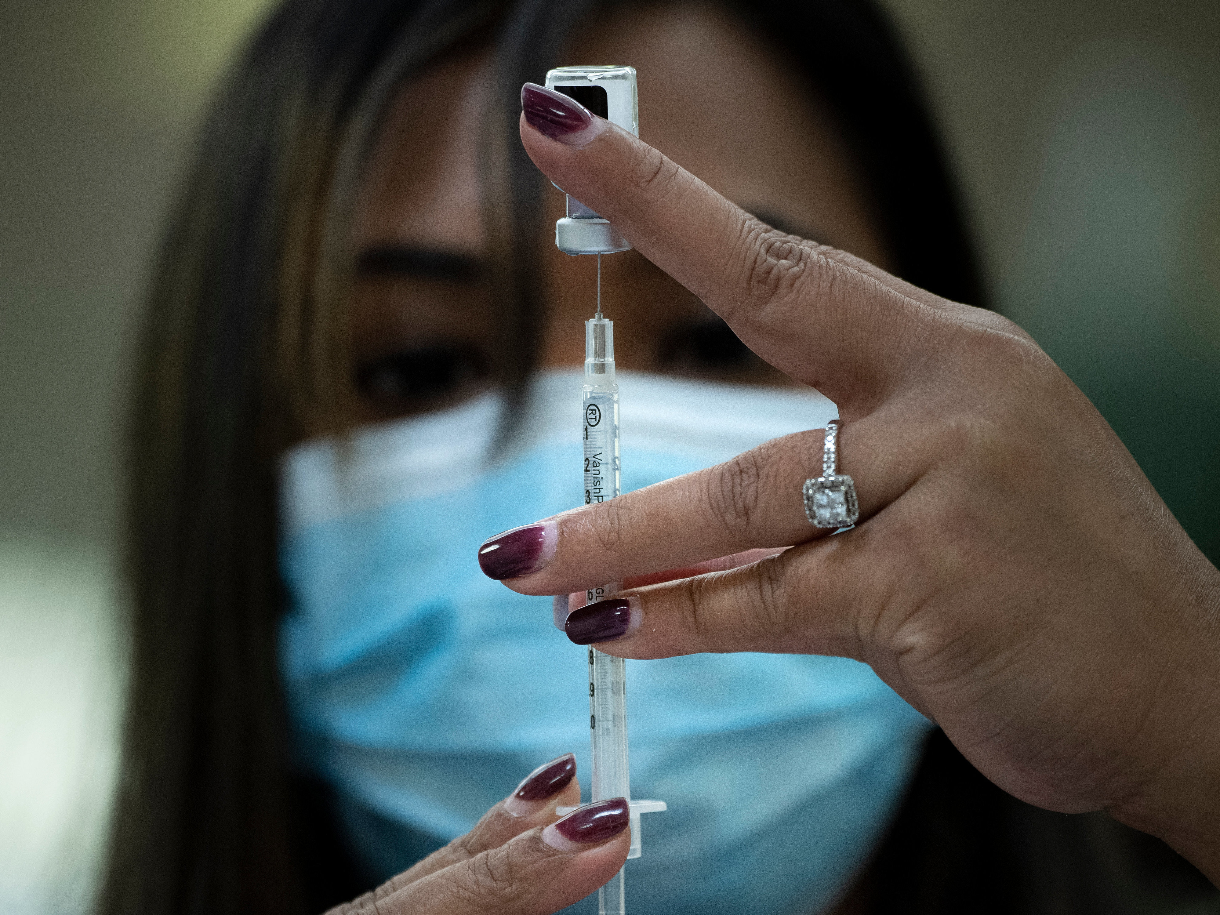 caption: The U.S. is unlikely to meet its goal of vaccinating 20 million Americans by the end of the year, health officials said this week.