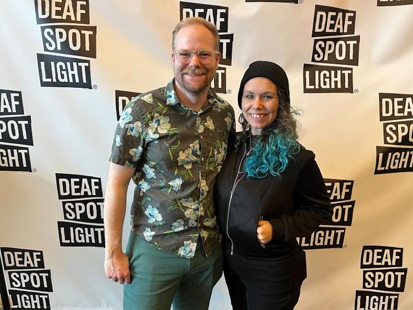 caption: Rogan Shannon (left) and Kellie Martin pose after the closing performance of Deaf Spotlight’s Short Play Festival at 12th Avenue Arts in Seattle, WA on March 5, 2023.