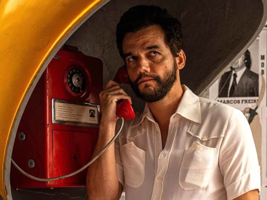caption: Wagner Moura plays a Brazilian scientist who becomes the target of powerful forces in <em>The Secret Agent.</em>