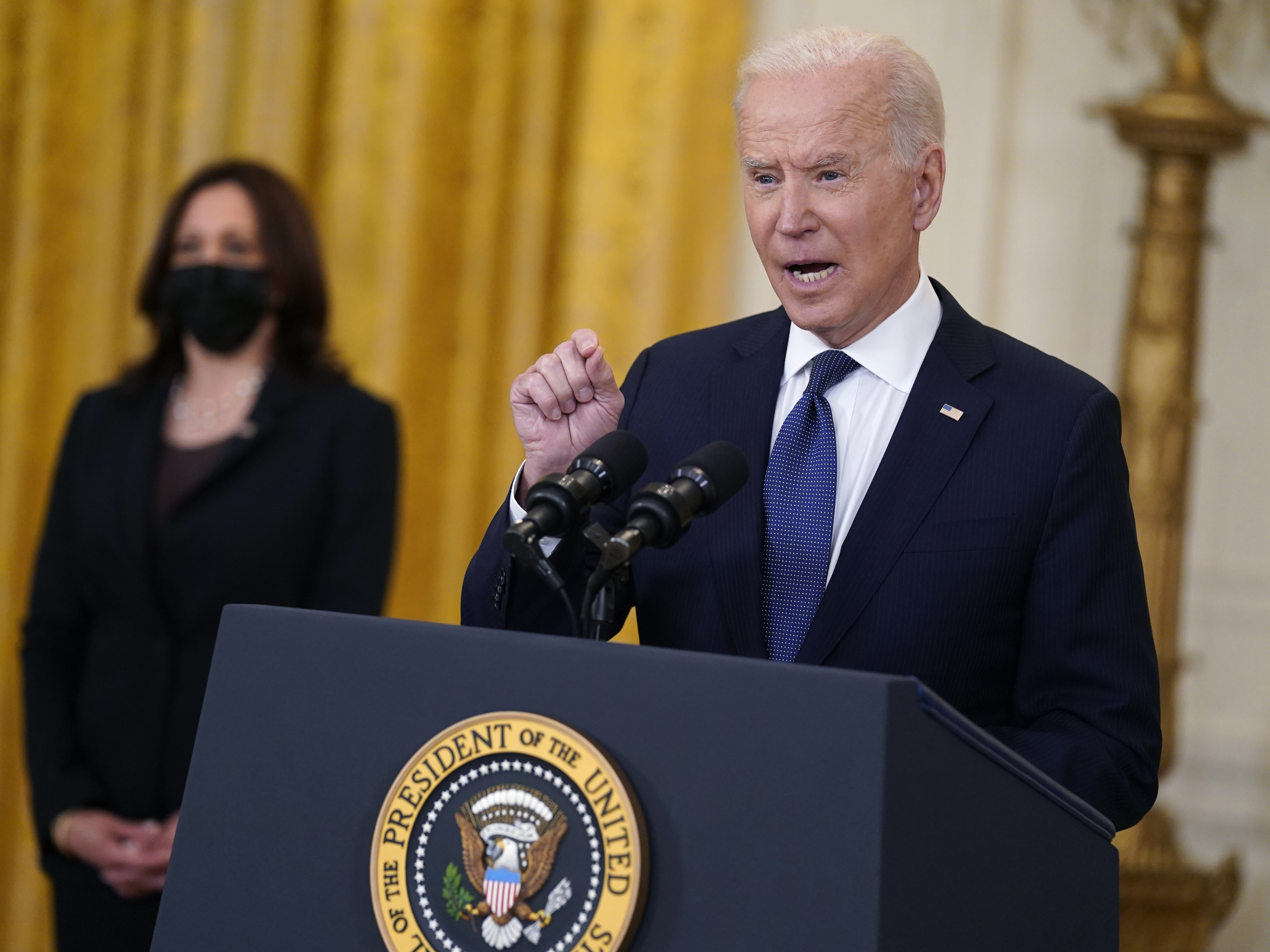 caption: President Biden speaks about the economy at the White House Monday. The Biden administration is arguing that higher-than-expected inflation is temporary.