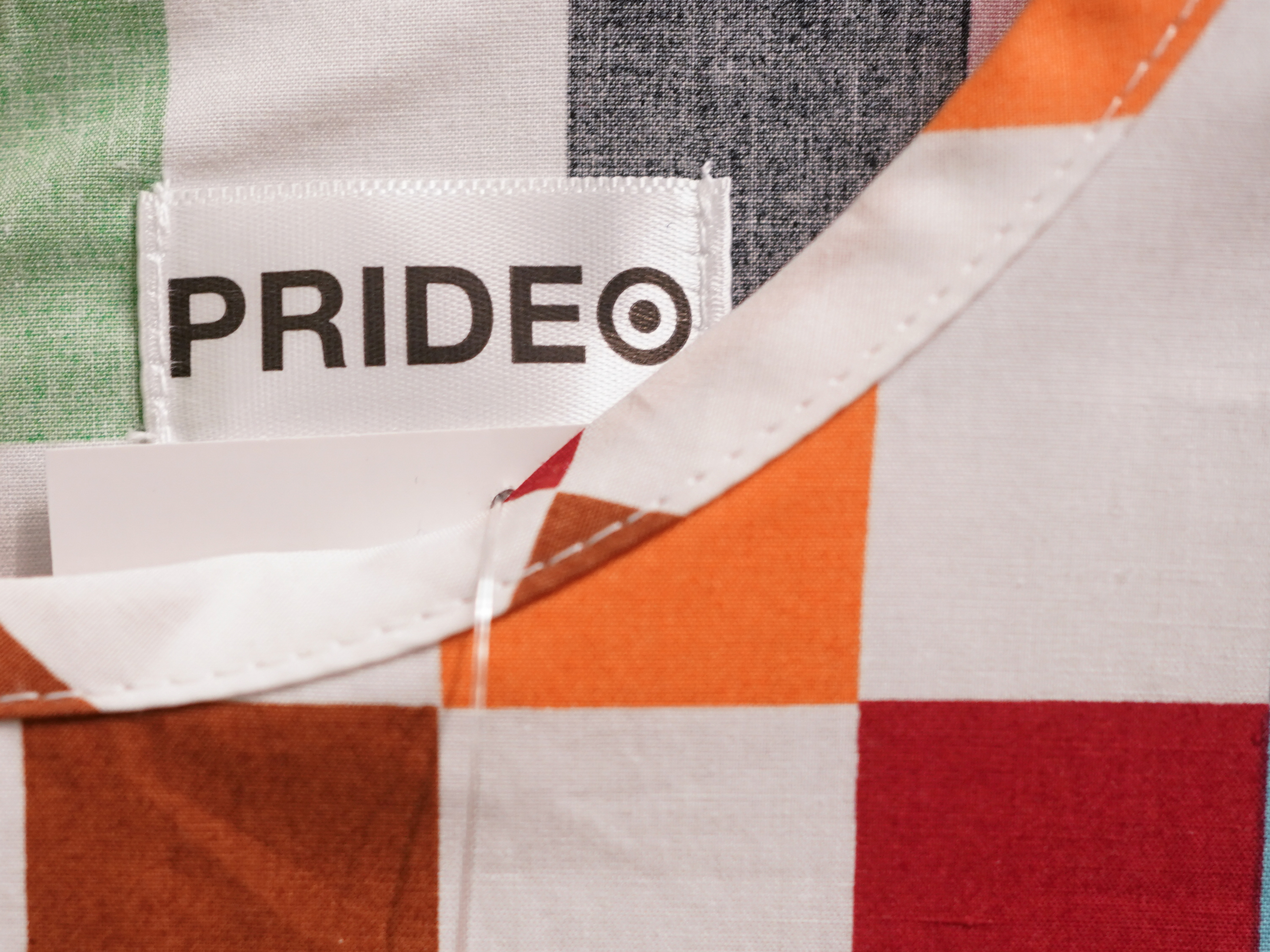 caption: Pride month merchandise is displayed at the front of a Target store in Hackensack, N.J., last month. The company pulled certain LGBTQ+ merchandise from its stores nationwide ahead of Pride month after an intense backlash from some customers including violent confrontations with its workers.