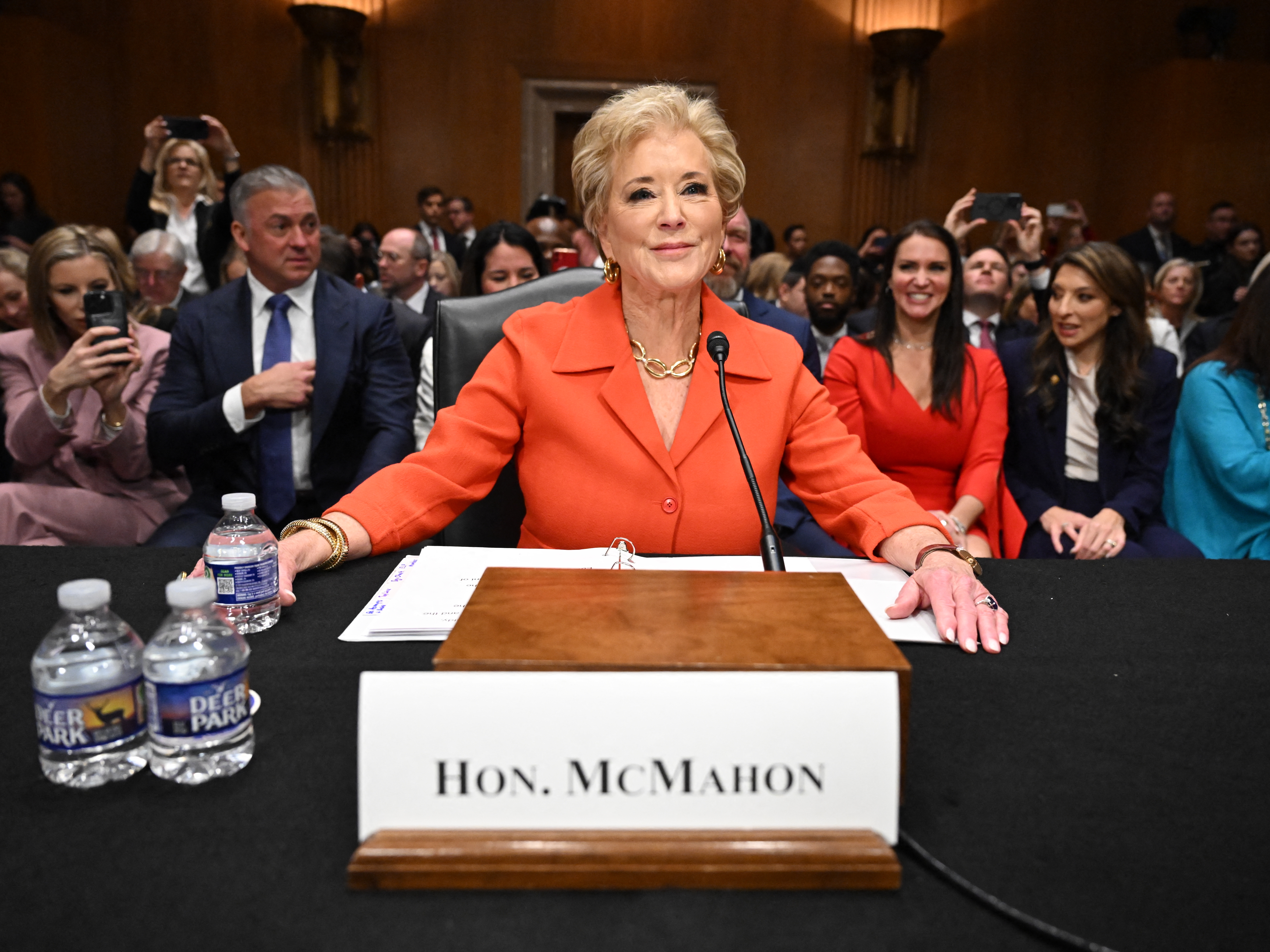 caption: Linda McMahon, pictured here at her Senate confirmation hearing in February, previously led the U.S. Small Business Administration and World Wrestling Entertainment (WWE).