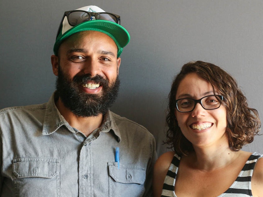 caption: Israel Baryeshua, 38, and Tiffany Briseño, 35, at their StoryCorps interview in Denver.