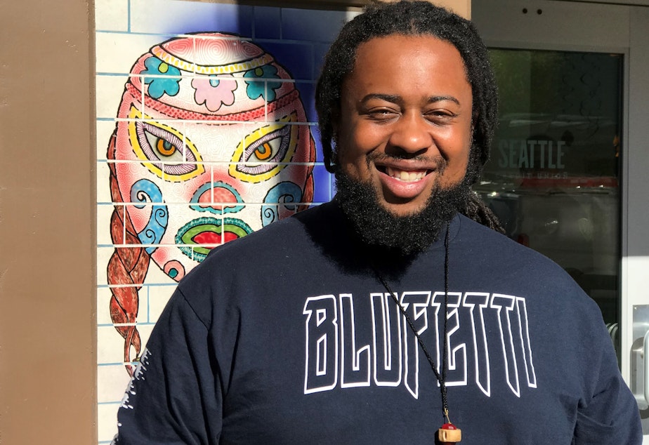 caption: Damon Bomar, owner/operator of That Brown Girl Cooks!