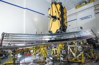 caption: On Tuesday, engineers successfully finished deploying the James Webb Space Telescope's sunshield, seen here during testing in December 2020 at Northrop Grumman in Redondo Beach, Calif.