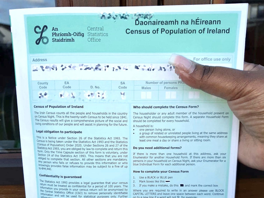caption: A person fills out an Irish census form on Sunday. A new time capsule feature allows people to add personal messages that stay under wraps for 100 years.
