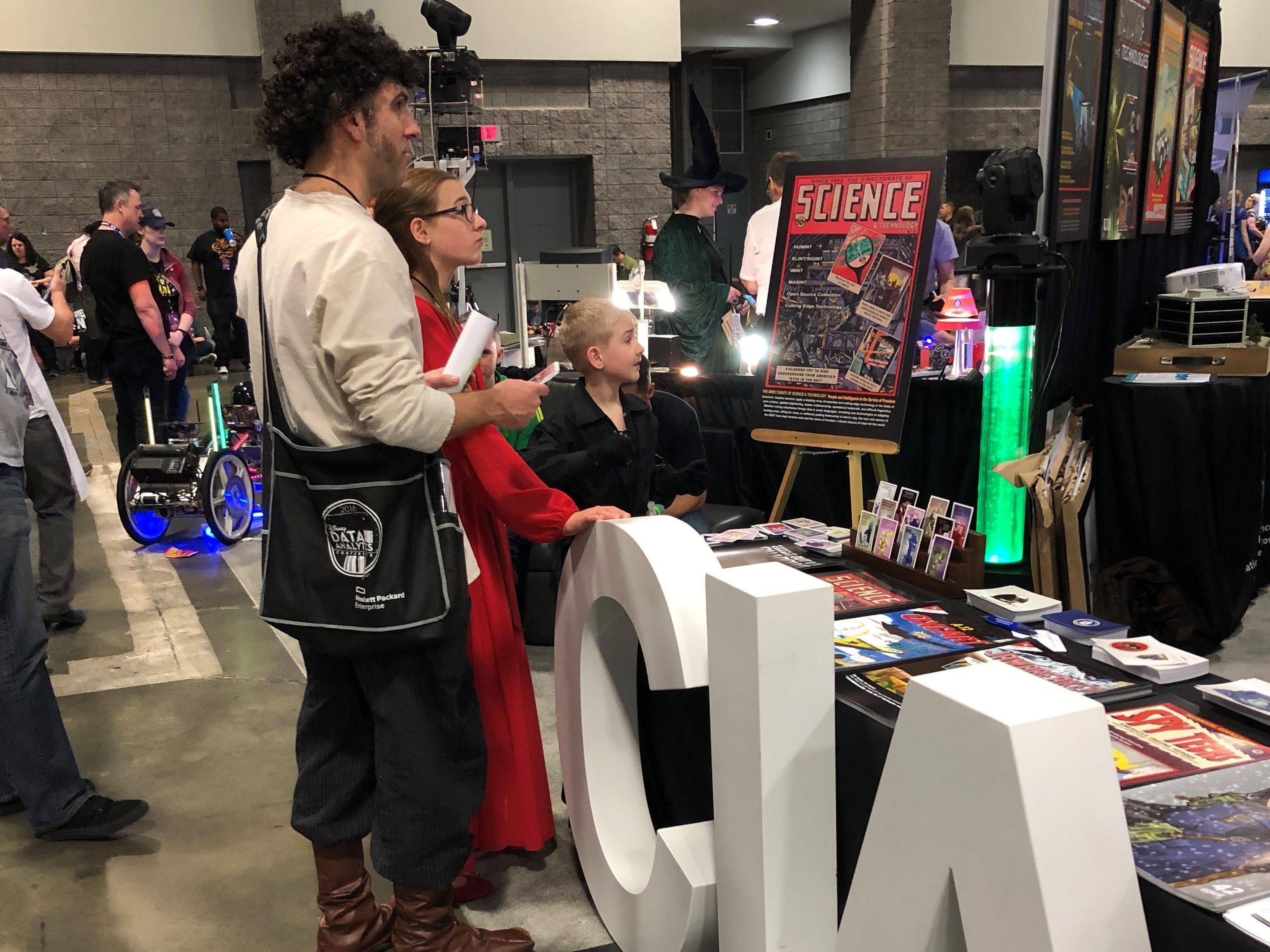 caption: The CIA had a booth at the recent Awesome Con gathering for movie and comic book superheros in Washington. It's one quirky example of the way the spy agency is reaching out to a broader potential pool of recruits.