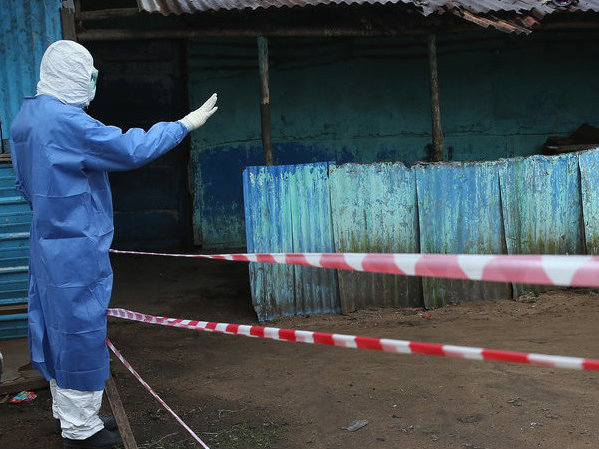 caption: After a long history of civil war and corruption, many Liberians didn't trust their government's attempts to control Ebola.