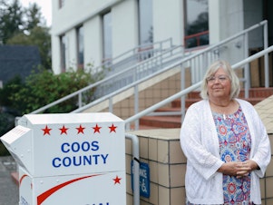 caption: Dede Murphy and other local election workers say members of an election denier group camped out in the hallways of their county building and yelled in their faces. Some say they were followed home or put in physical danger. Election workers across 22 states tell NPR they've received threats or felt unsafe doing their jobs.