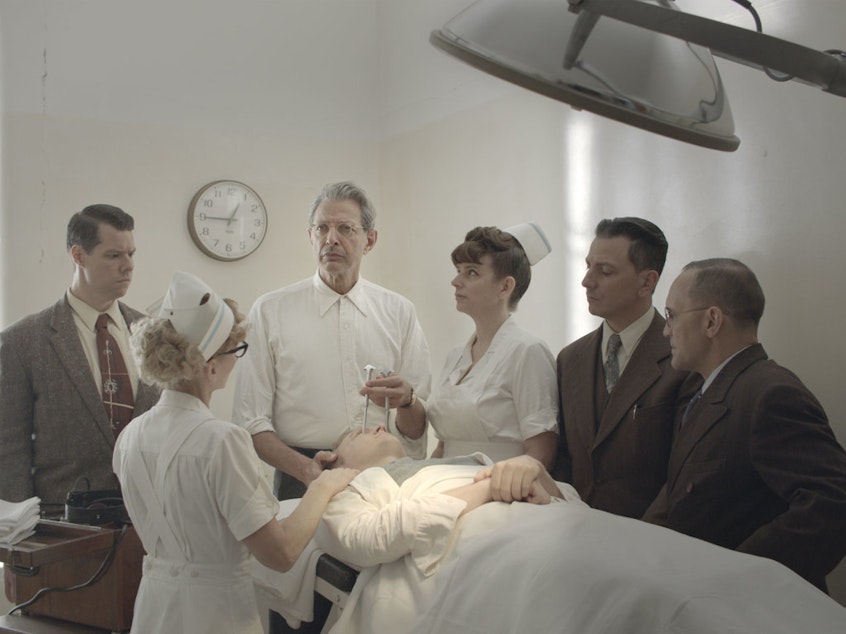 caption: Sometimes it <em>is</em> brain surgery: Jeff Goldblum (center) stars in Rick Alverson's film about a traveling lobotomist in the 1950s.