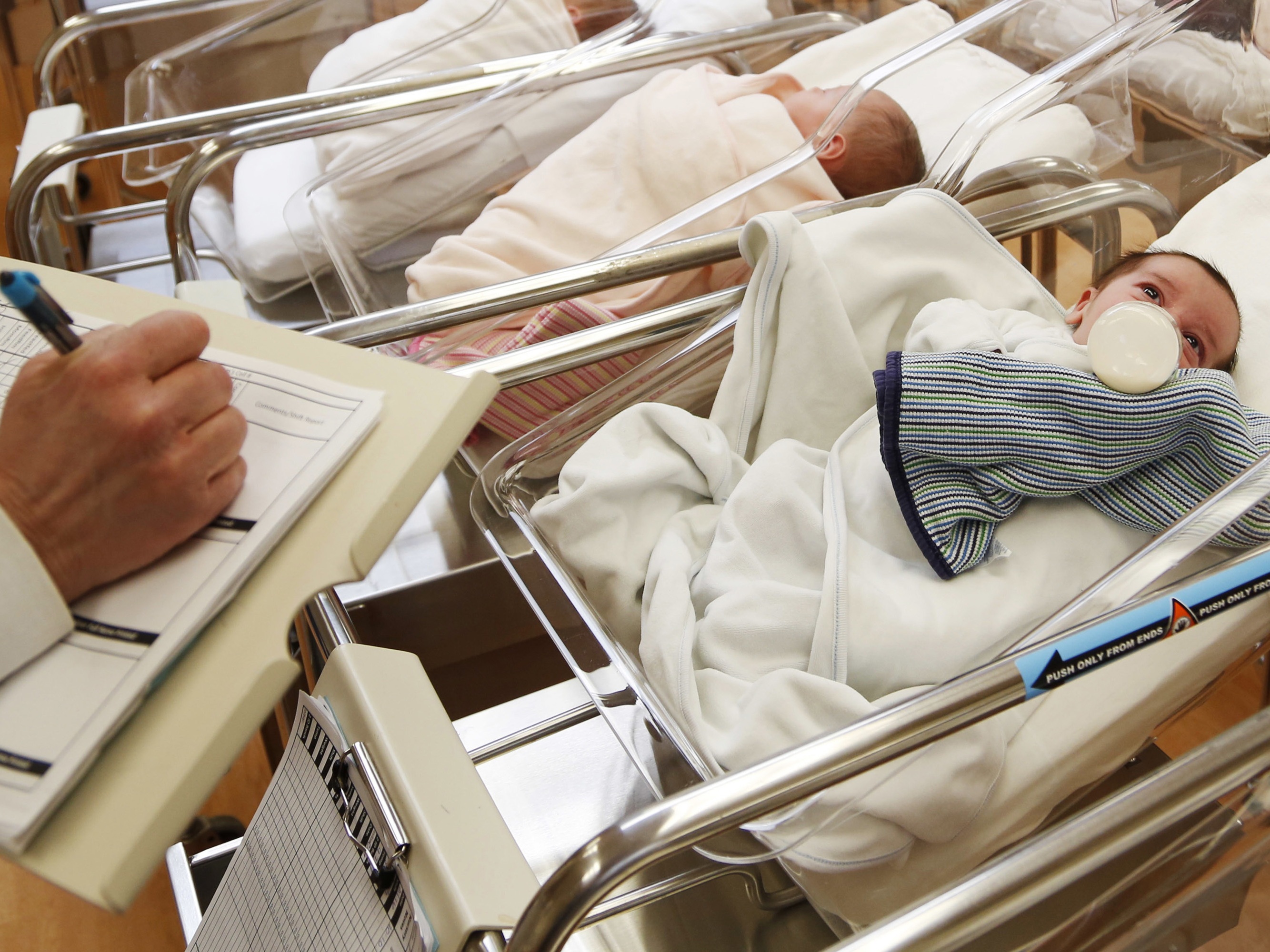 caption: File photo showing babies in a U.S. maternity ward. The fertility rate in the U.S. has dropped steadily. Last year, there were roughly 710,000 fewer children born in the U.S. compared with the peak in 2007.