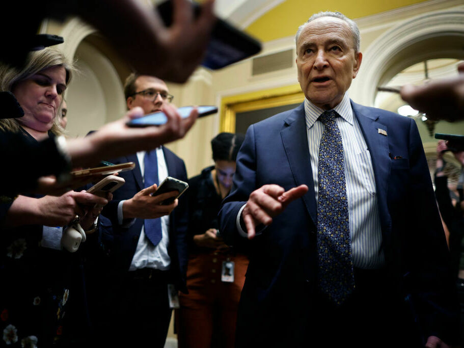 caption: Senate Majority Leader Chuck Schumer, D-N.Y., talks reporters as he returns to the U.S. Capitol following meetings at the White House on Tuesday.