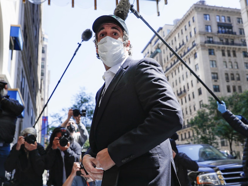 caption: A federal judge found that Michael Cohen's return to prison earlier this month was a violation of his first amendment rights. Cohen, shown here in May, had previously been granted home due to coronavirus concerns.