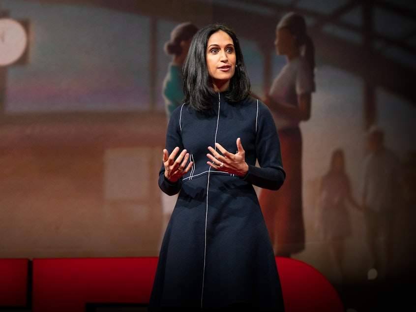 caption: Priya Parker on the TED stage