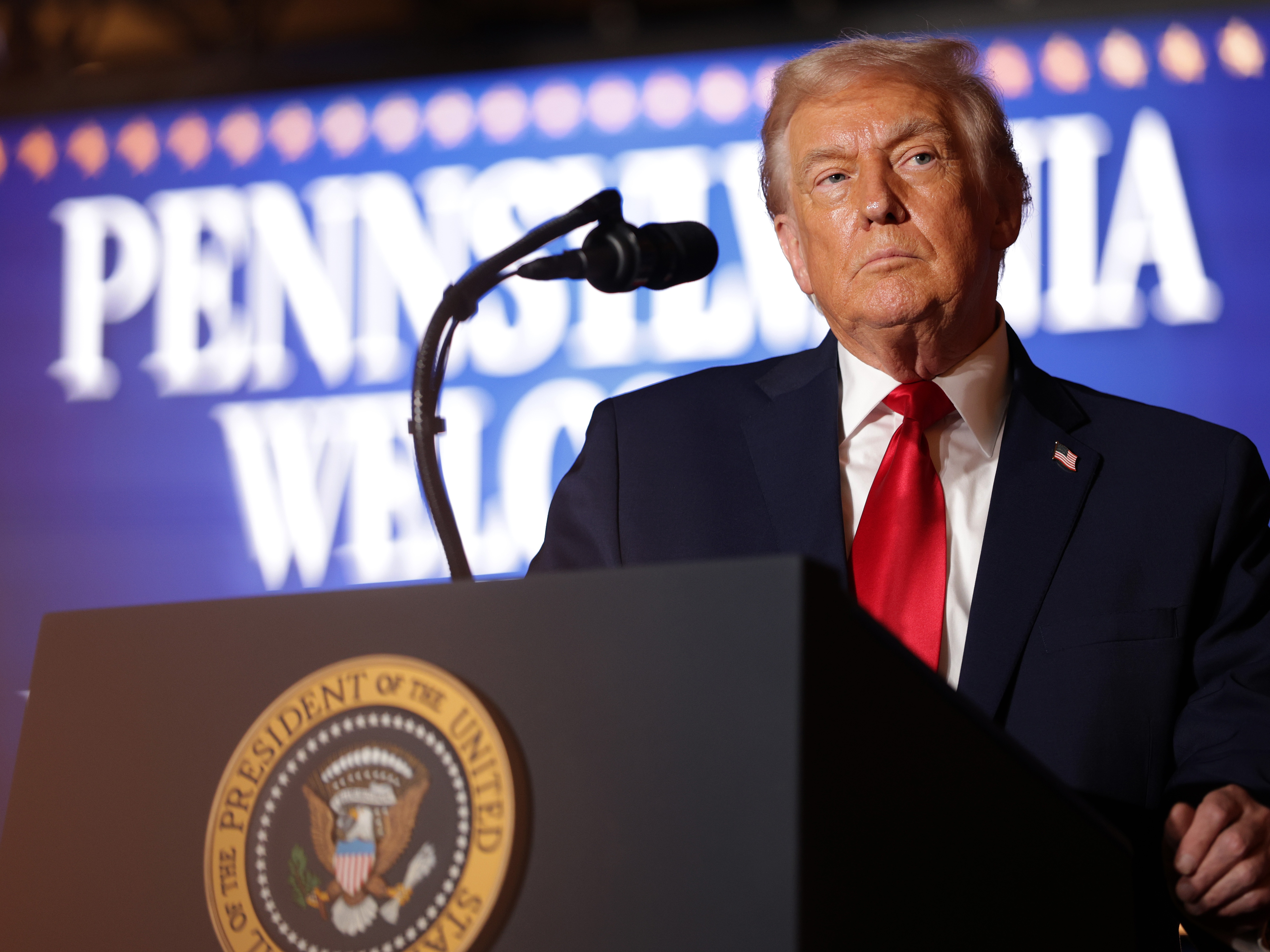caption: U.S. President Donald Trump delivers remarks during an event at Mount Airy Casino Resort on December 9, 2025 in Mount Pocono, Pennsylvania. Trump discussed his administration's economic agenda and its efforts to lower the cost of living.