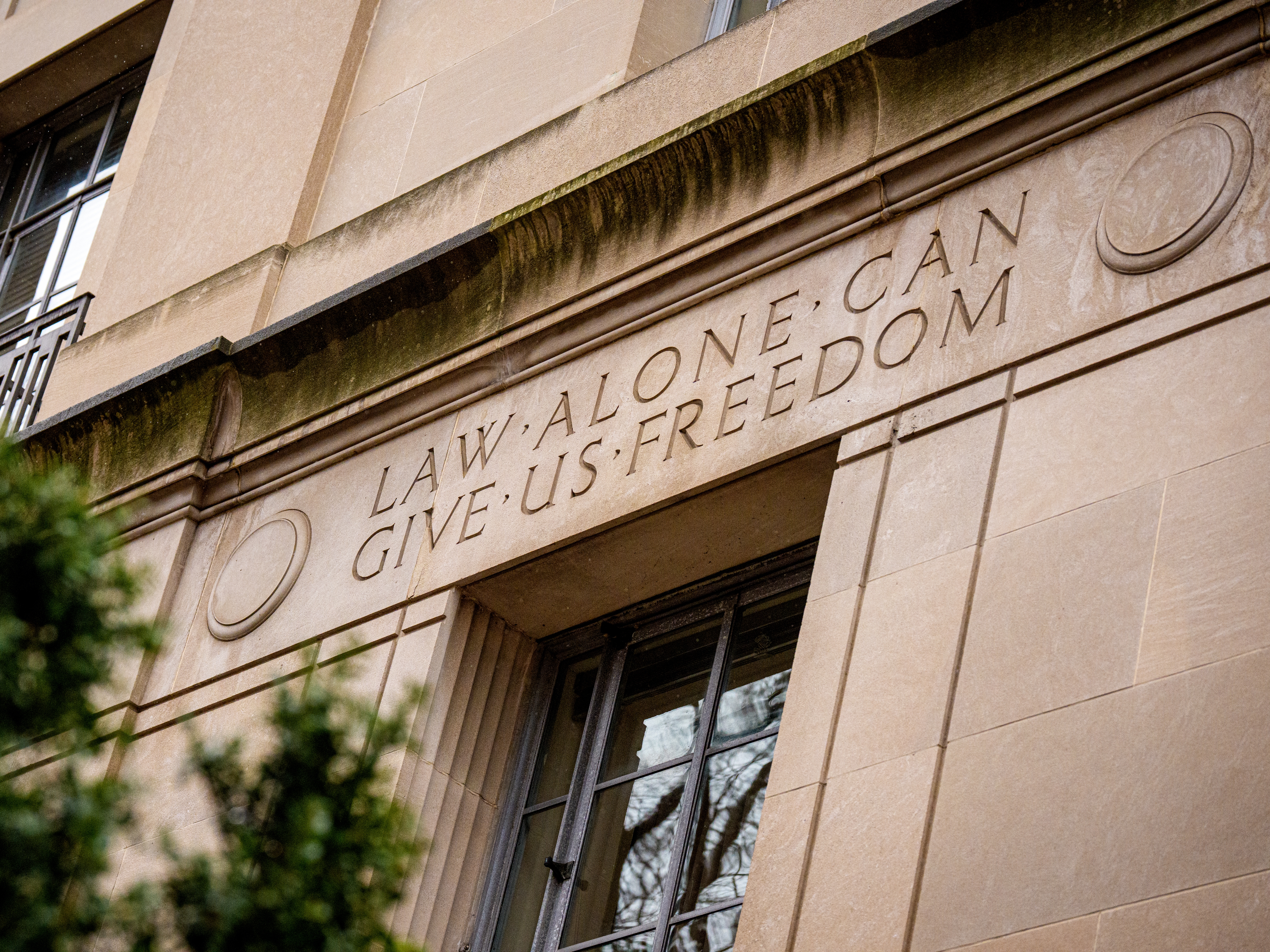 caption: The Robert F. Kennedy Department of Justice Building on Dec. 19, 2025 in Washington, DC.