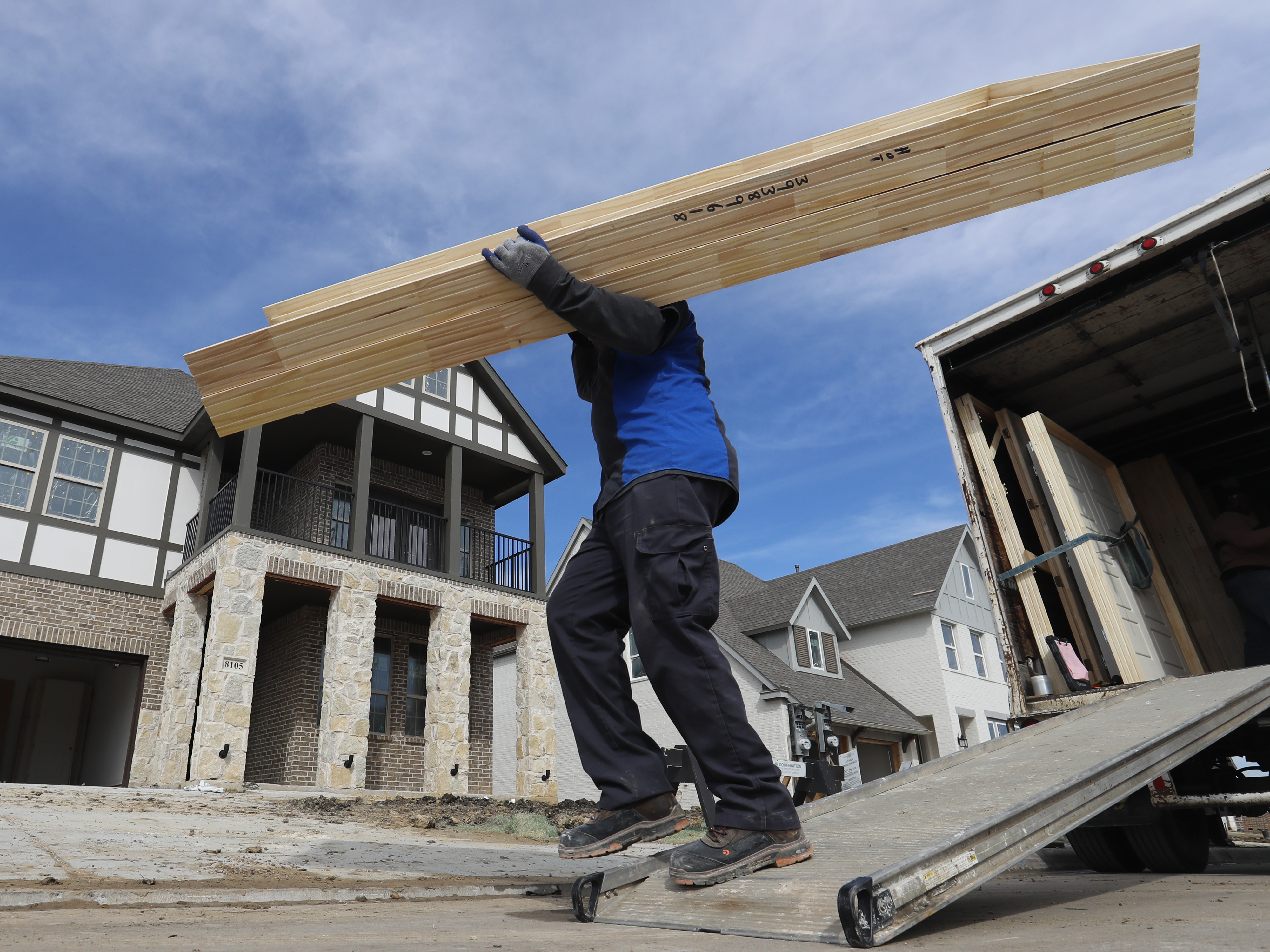 caption: The U.S. economy grew 2.9 percent last year, just missing President Trump's 3-percent target.