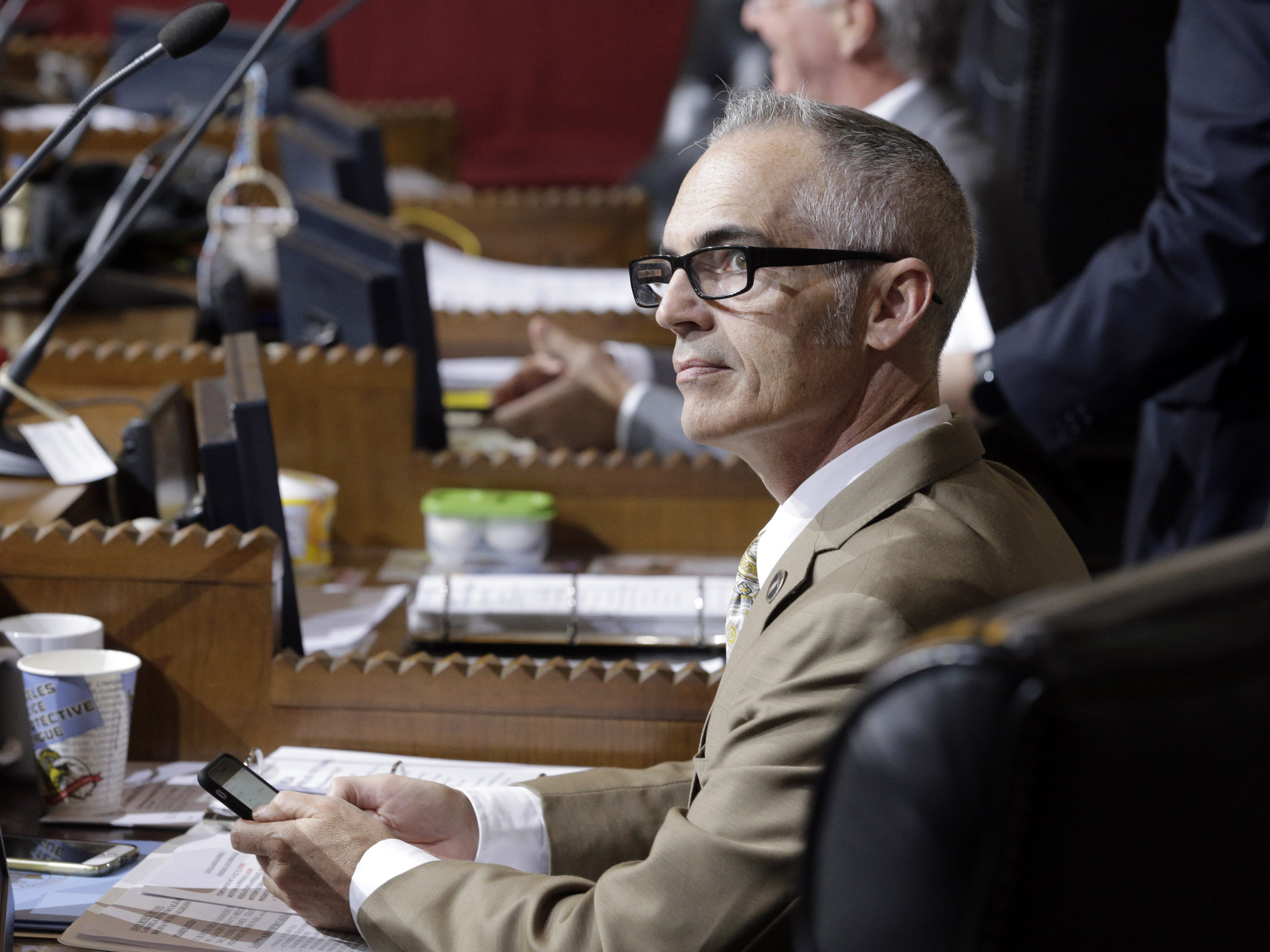 caption: Los Angeles City Councilman Mitch O'Farrell, seen in Council Chambers in 2015, originally introduced the measure that requires city contractors to fully disclose any sponsorship of, or contract with, the NRA. The gun rights group is challenging the ordinance.
