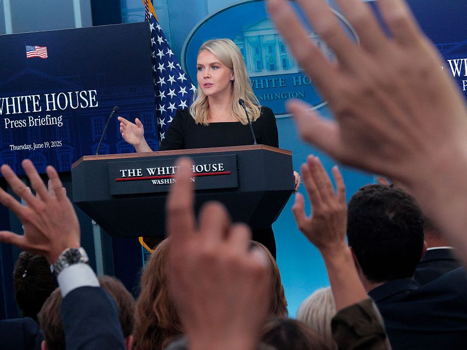 caption: White House press secretary Karoline Leavitt takes questions from reporters during a press briefing at the White House in June 2025.