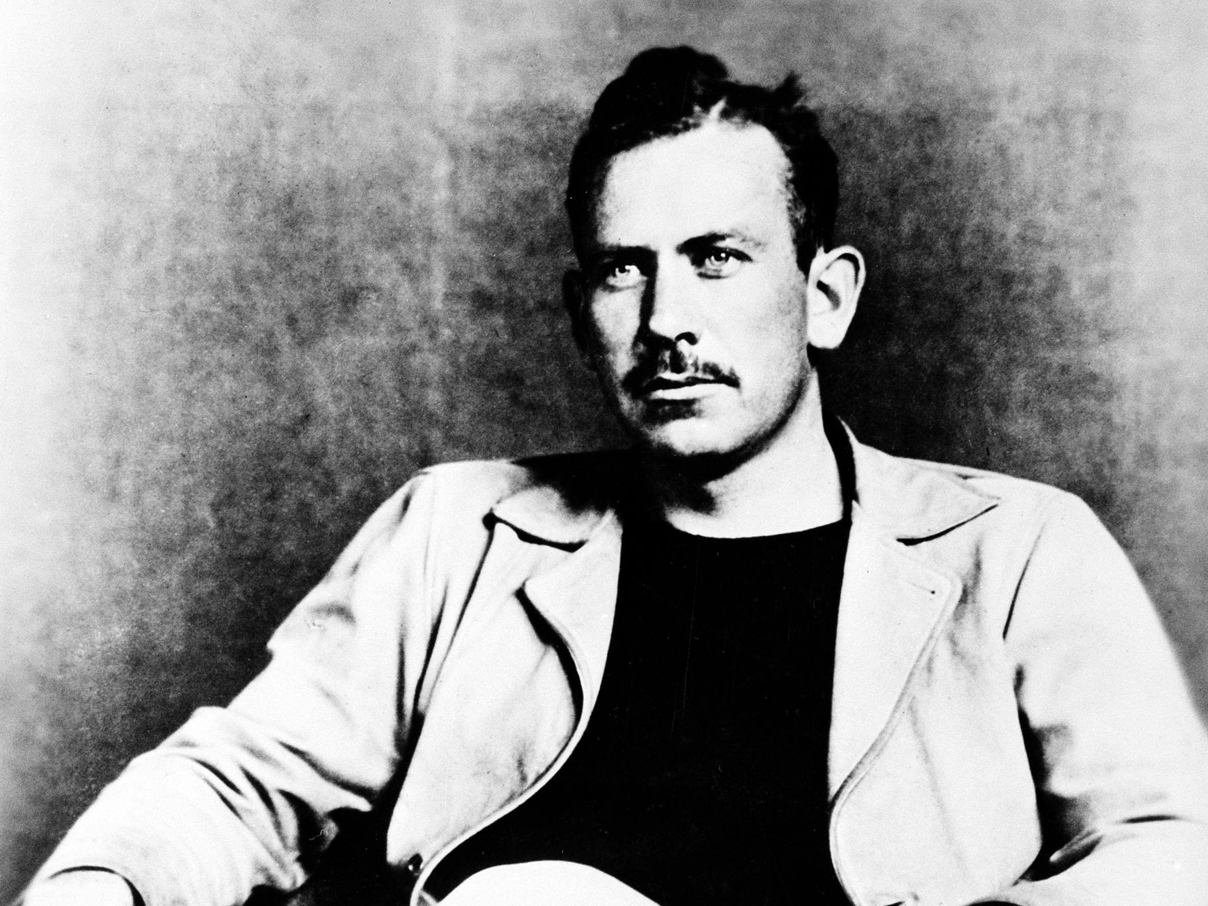 caption: American author John Steinbeck, winner of the 1940 Pulitzer Prize for his novel <em>The Grapes of Wrath </em>and 1962 Nobel Prize in Literature laureate, in an undated photo. An early, unpublished Steinbeck novel concerns brutal murders and a werewolf.