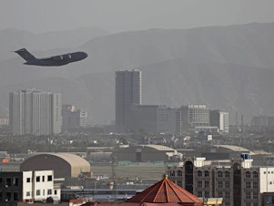 caption: A U.S. Air Force aircraft takes off from Kabul on Friday.