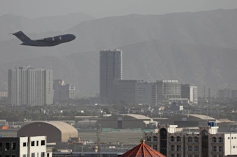 caption: A U.S. Air Force aircraft takes off from Kabul on Friday.